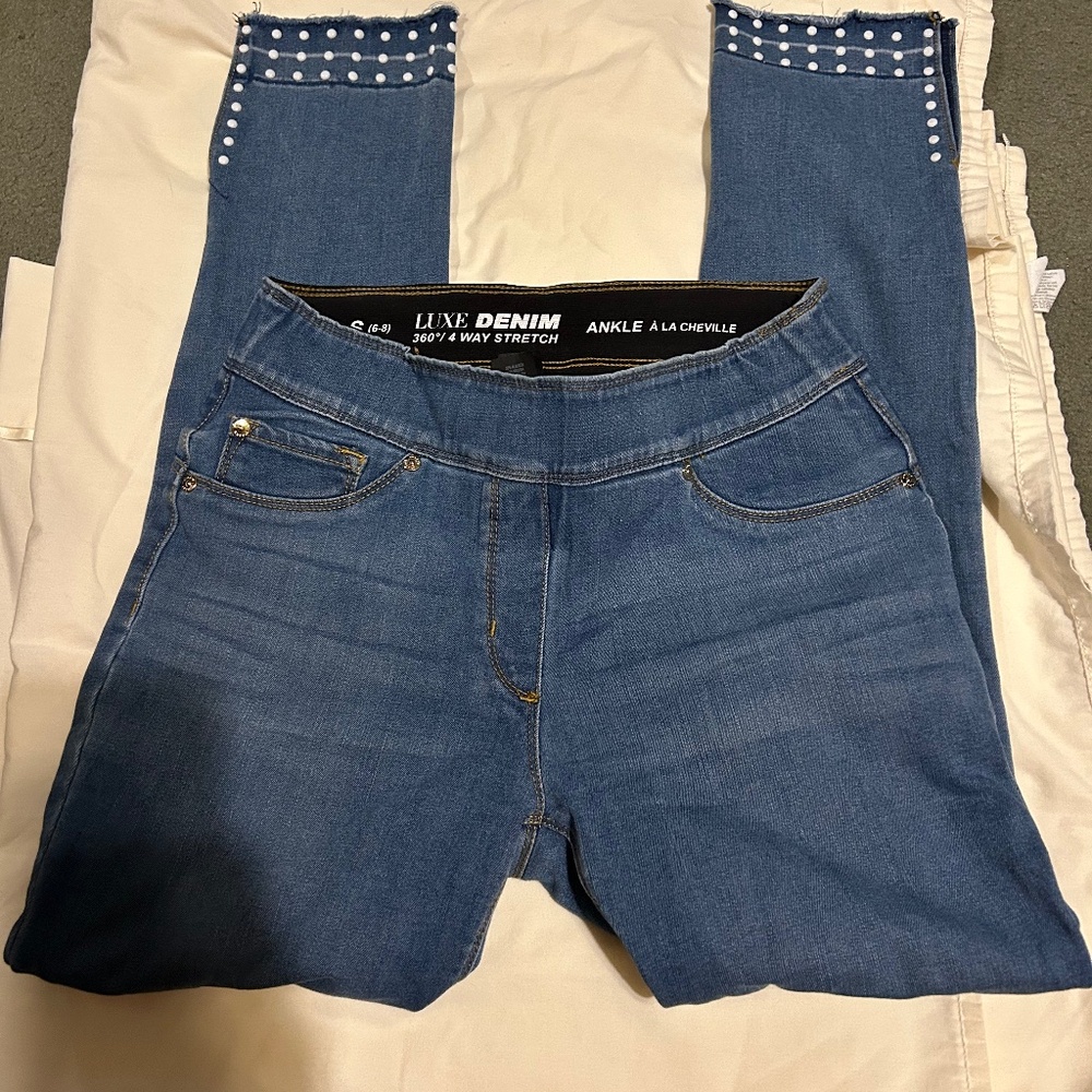 Luxe Denim 4 way stretch ankle jeans with little white beads around ankles.